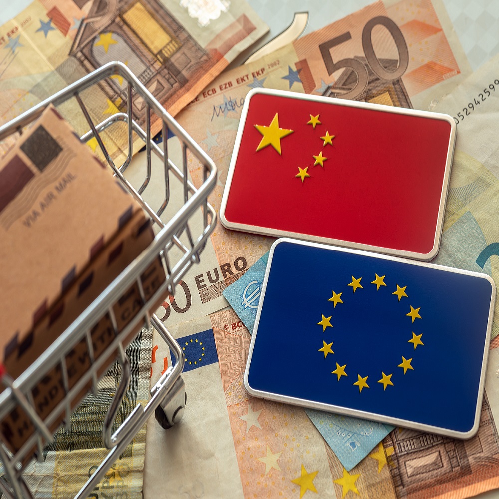 EURO vs. Yuan. European and Chinese flags